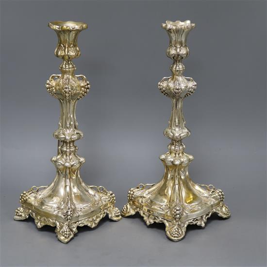 A pair of Continental metal candlesticks height 30.5cm